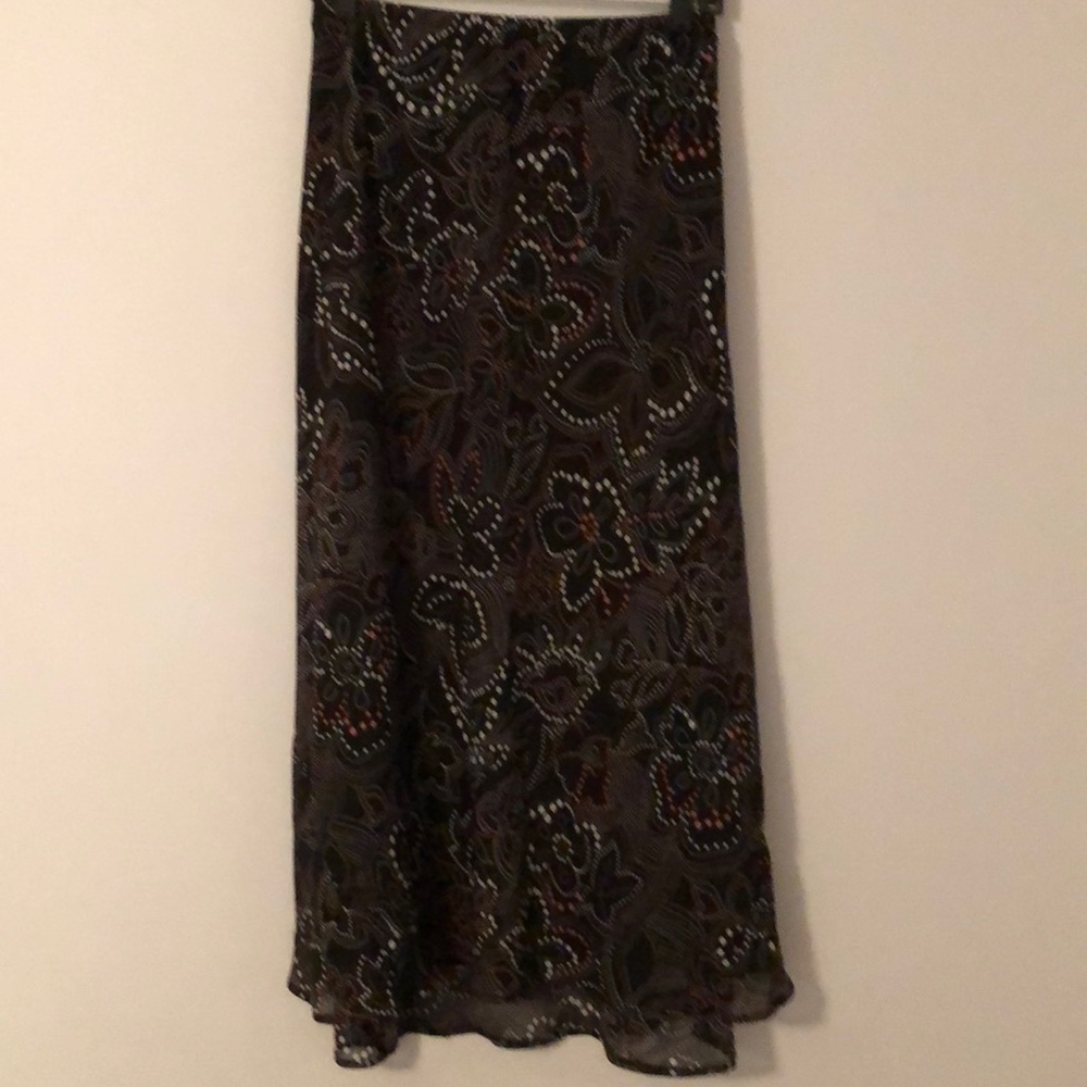 Black Skirt with salmon and white polka dots.